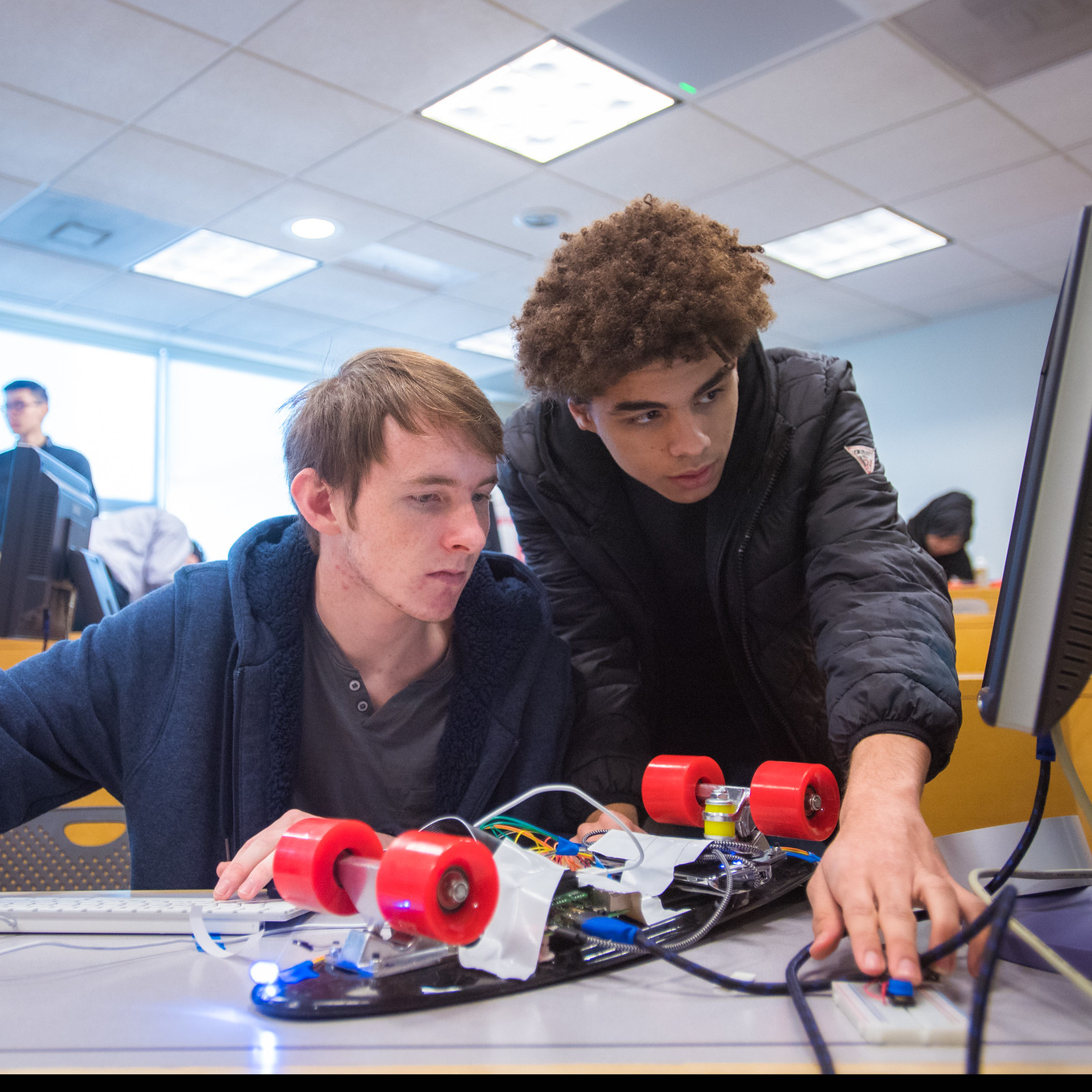 MITES Saturdays students work on robotics project